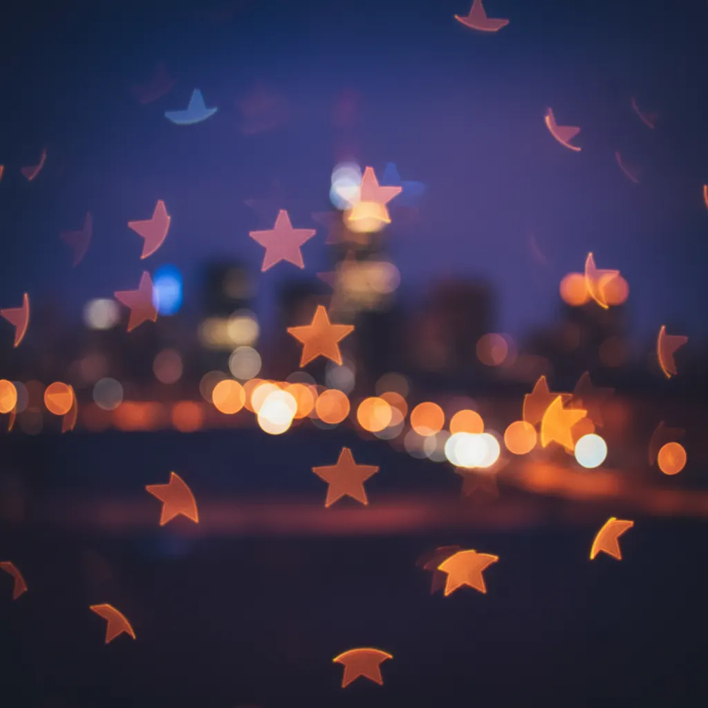 Creative bokeh with heart and star shaped light orbs
